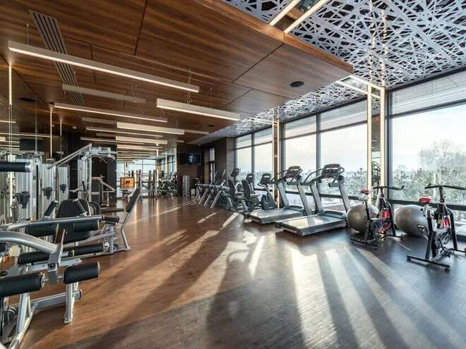 Commercial gym floor with cardio and strength equipment — Heartbeat Fitness Repair provides on-site commercial fitness equipment repair throughout Tampa Bay, FL